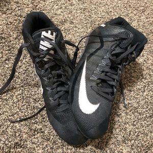 Football cleats with tools